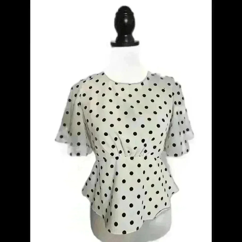 Chic Polka Dot Peplum Top with Sheer Sleeves
